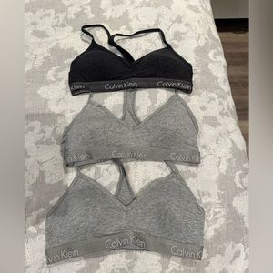 Three Calvin Klein bralettes - different shades of gray